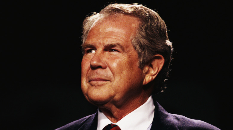 Pat Robertson squinting and staring out