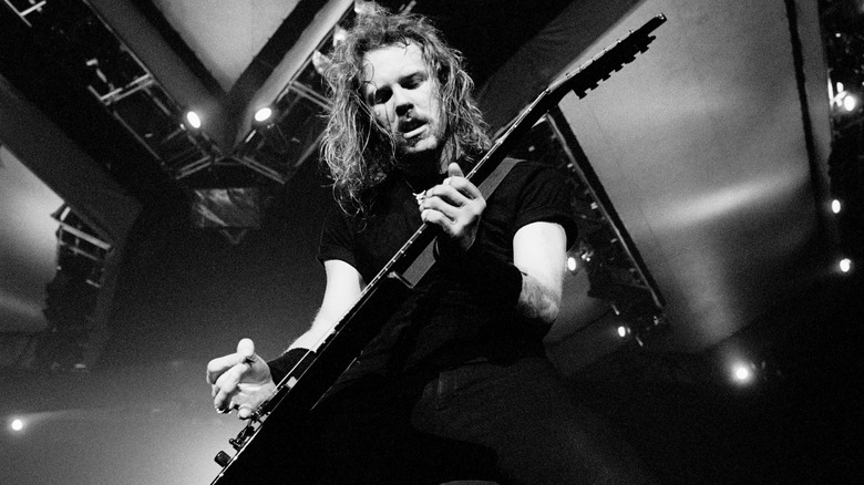 James Hetfield playing guitar onstage