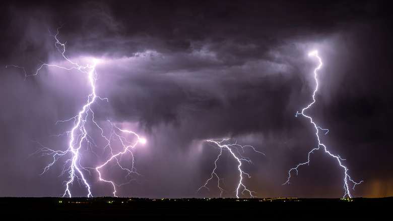 Lightning striking ground during storm