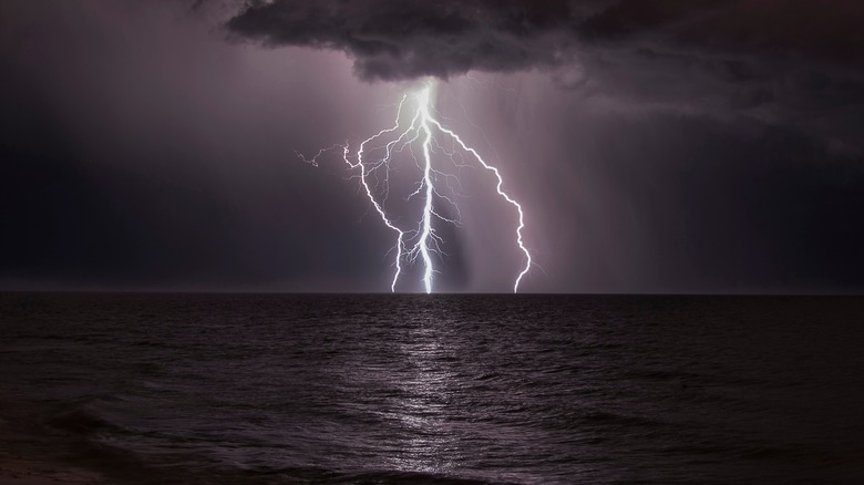 Lightning over a body of water