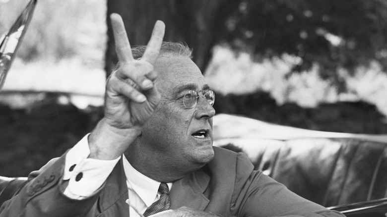 Franklin D. Roosevelt holding up two fingers
