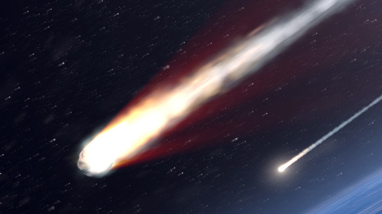 meteor shower over trees