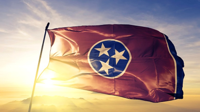 Tennessee flag waving in sky