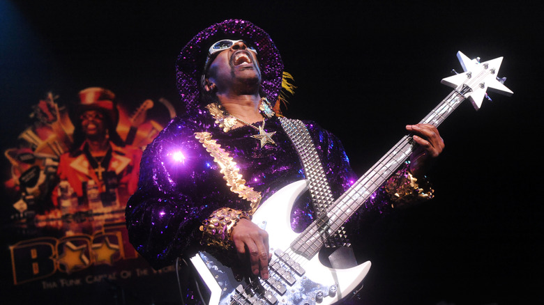 Bootsy Collins playing his iconic star-shaped bass guitar