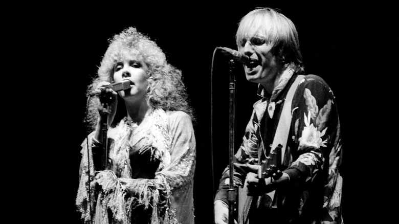 Stevie Nicks and Tom Petty perform in 1981