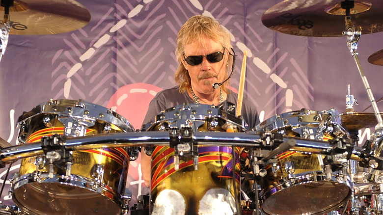 Frank Beard playing drums onstage