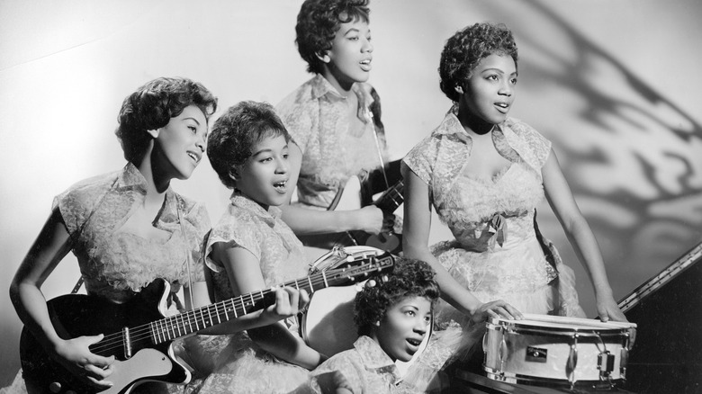 Group portrait of the Chantels with musical instruments, 1958
