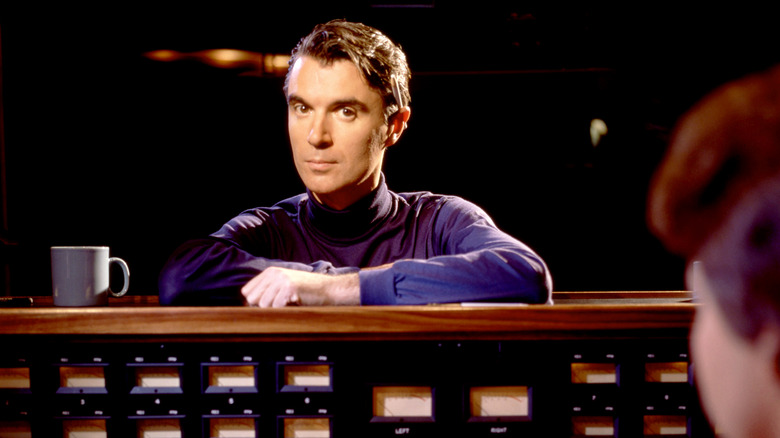 David Byrne posing for studio photo