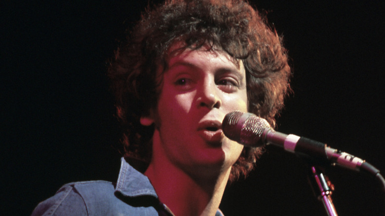 Eric Carmen of the Raspberries singing onstage in the '70s
