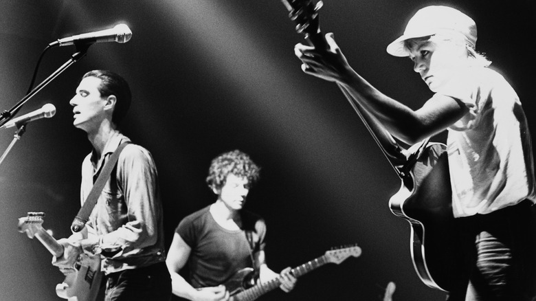 Talking Heads onstage with instruments