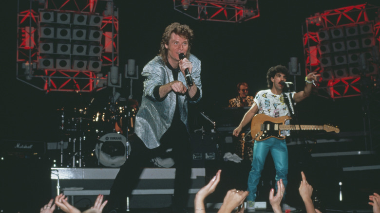 Daryl Hall and John Oates (right) of Hall & Oates perform live on stage, 1984.