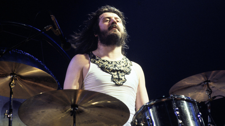 John Bonham standing up behind kit