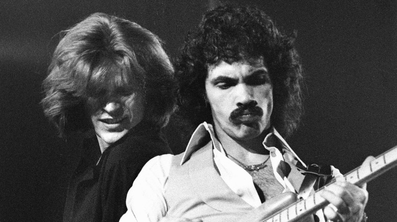 Daryl Hall and John Oates rocking out onstage