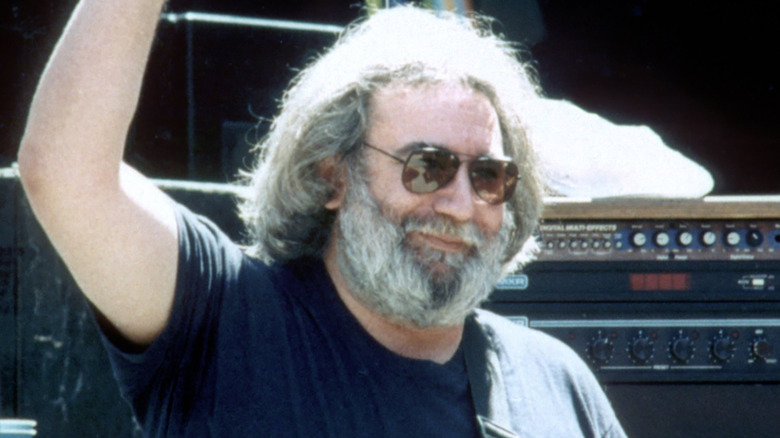 Jerry Garcia waving from stage
