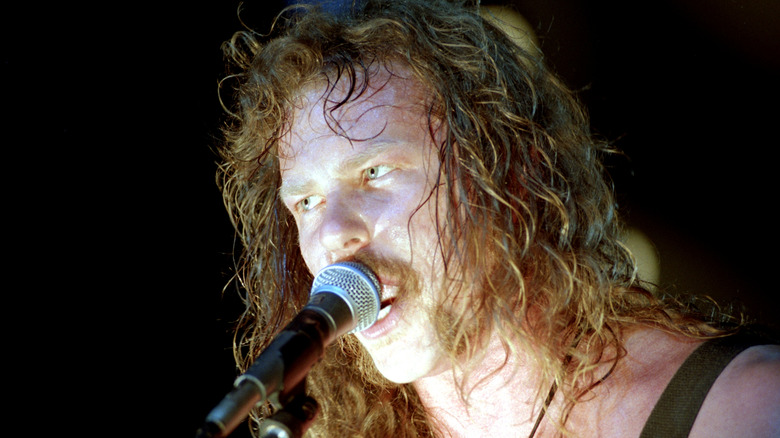 James Hetfield of Metallica singing into a microphone in 1992