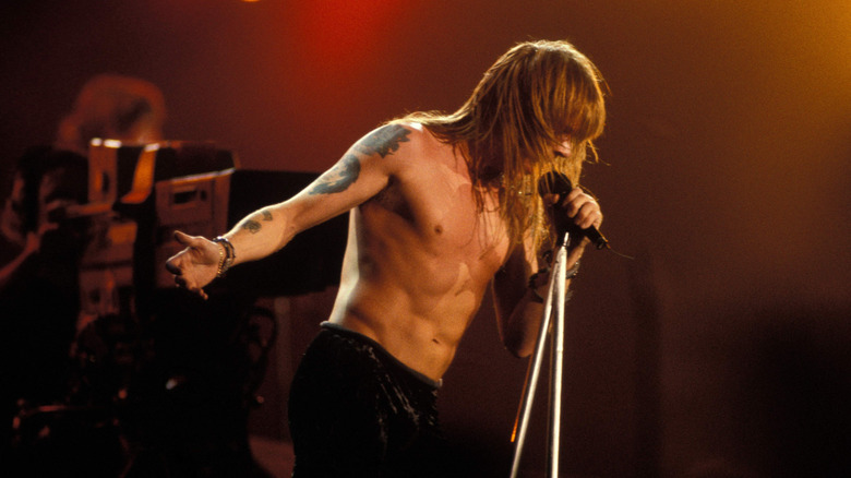 Axl Rose of Guns N' Roses on stage in 1991