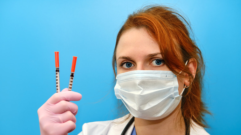 Redheaded doctor with drugs