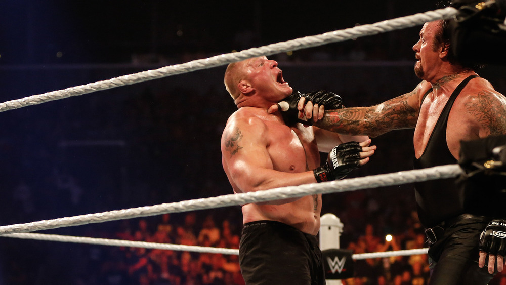 The Undertaker choking Brock Lesnar