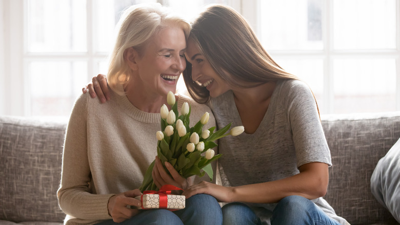 mother and daughter smiling