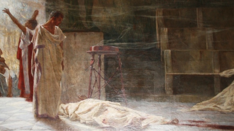 mark anthony standing over caesar's body