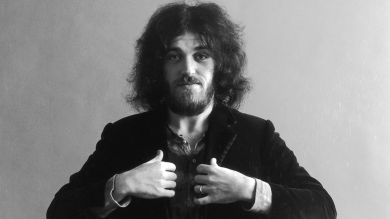 Joe Cocker gripping coat lapels