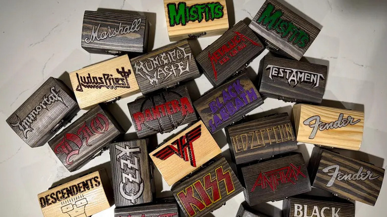 Miniature wooden chests designed with band logos