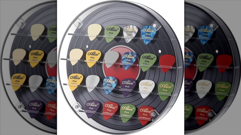 Guitar pick display shaped like a vinyl record