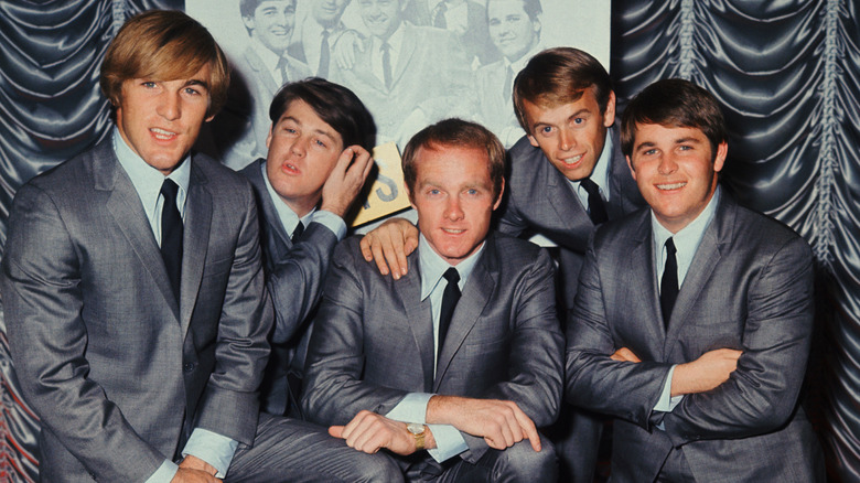 The Beach Boys posing for a photo.