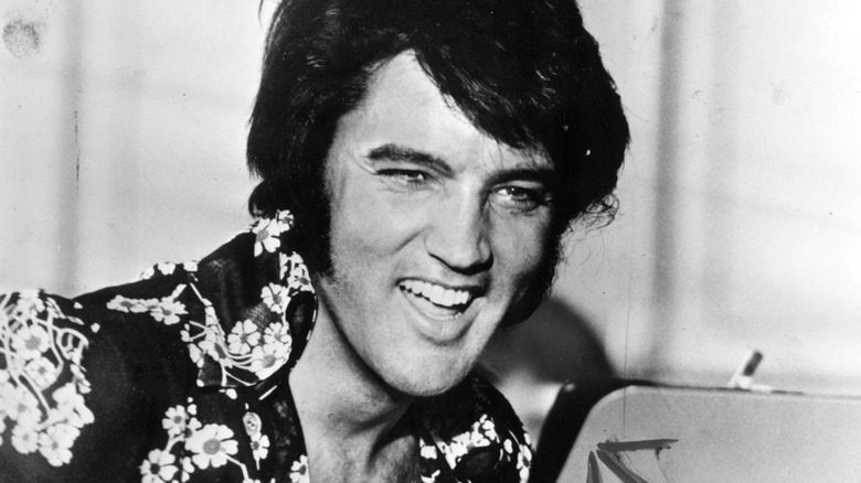 Elvis Presley enjoys a laugh