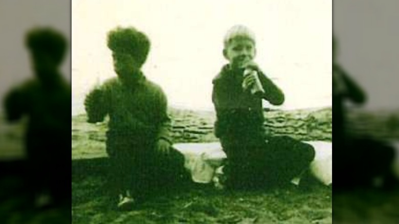 A black-and-white image of Derek and David D'Alton