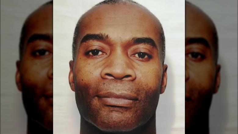A mugshot of the UK's Night Stalker, Delroy Grant