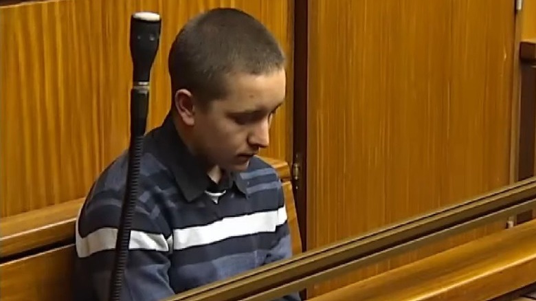 Morne Harmse bows head in court