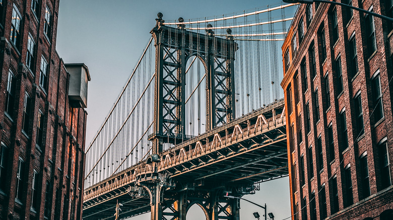 Brooklyn Bridge between buildings