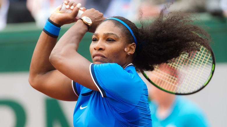 Serena swinging racket