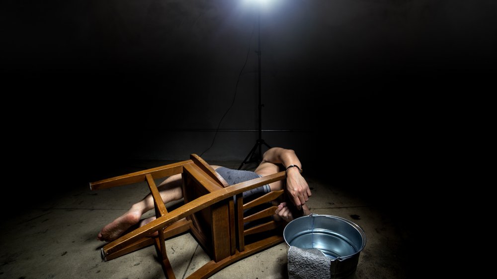 Prisoner being waterboarded