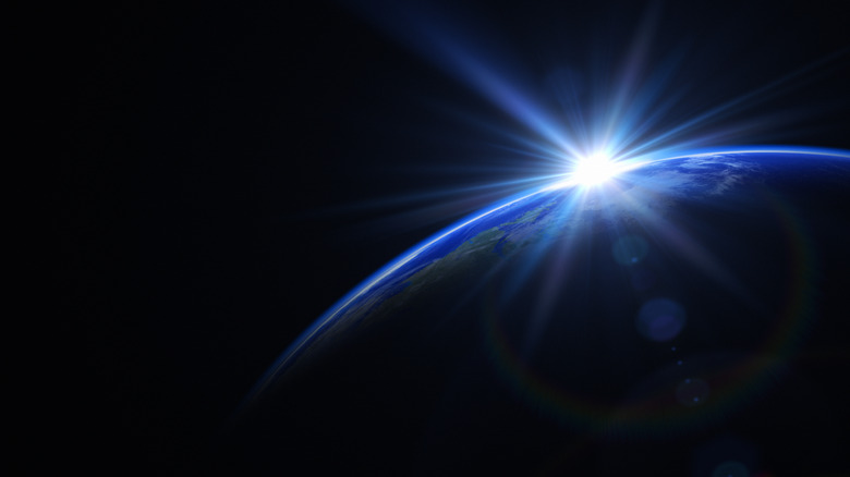 Rendering of a planet with blue flash behind it
