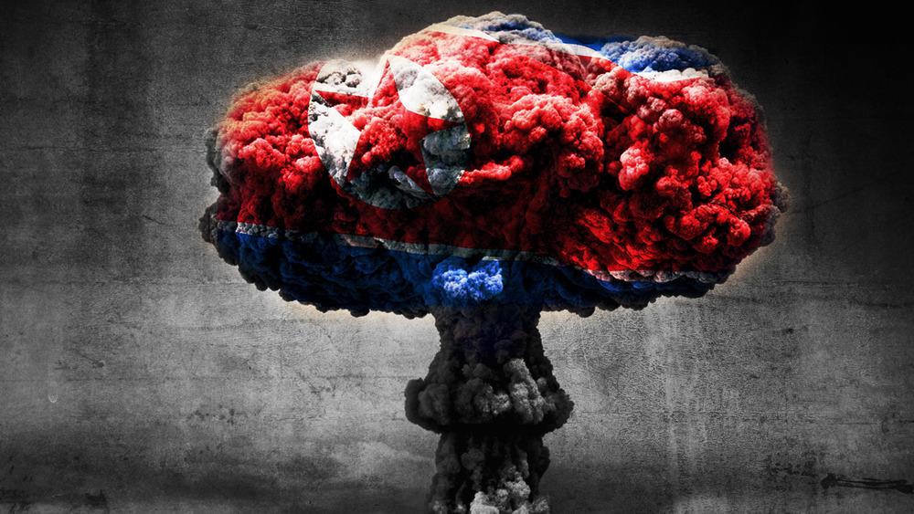 Nuclear mushroom cloud with North Korean flag superimposed 