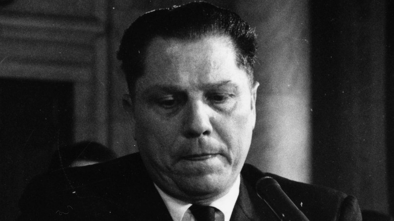 Jimmy Hoffa sitting at desk