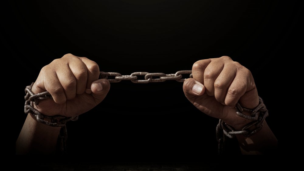person in chains