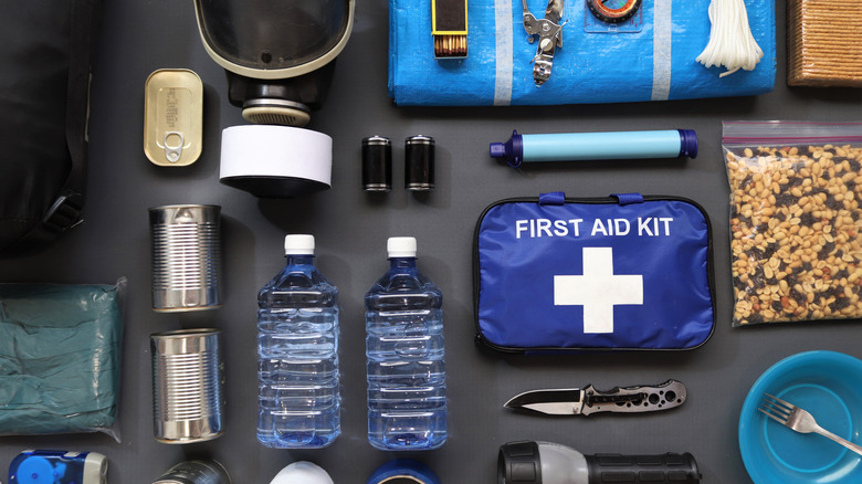 simple preparation kit with water, food, and medical supplies