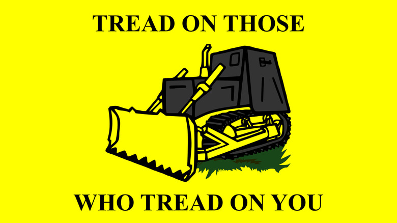 gadsden flag with bulldozer and caption "tread on those who tread on you"