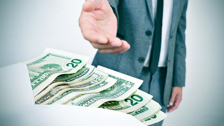 Man taking bribe