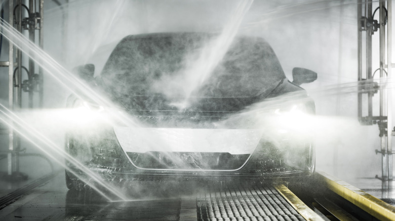 car driving through a car wash