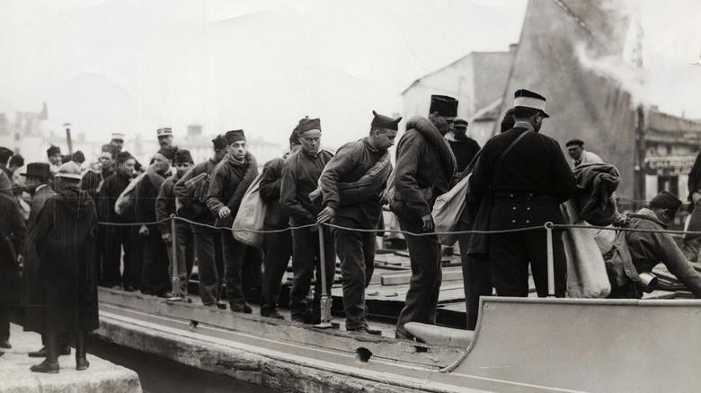 Prisoners boarding ship to Devil's Island