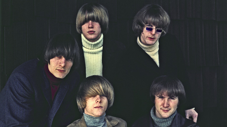 The Byrds posing together in smart, warm clothing