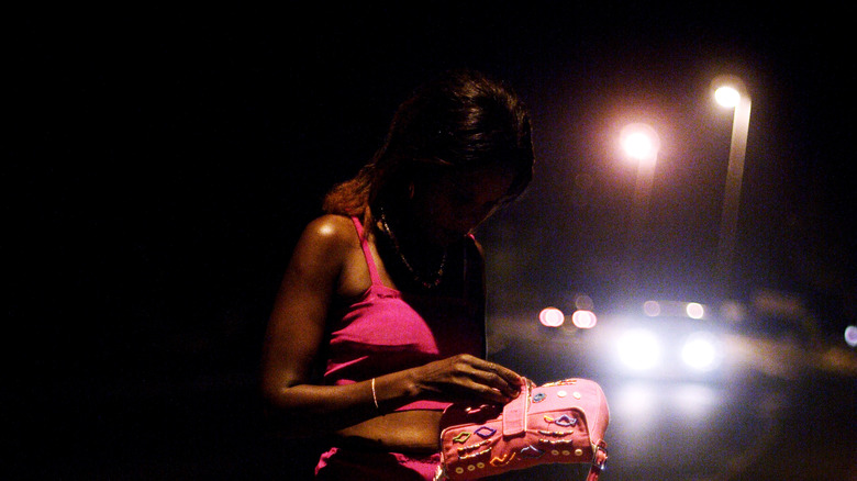 Sex worker in pink clothing