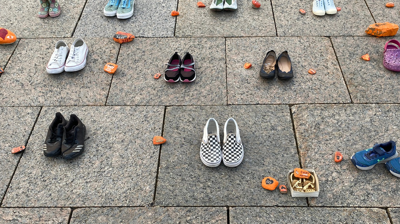 Children's shoes on pavers