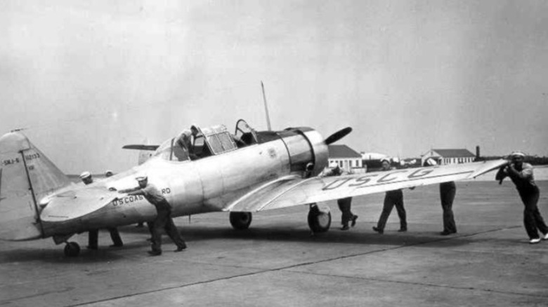US Coast Guard plane with crew
