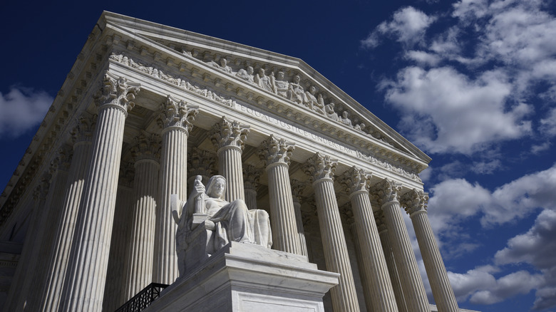 Lady Justice sits before Supreme Court