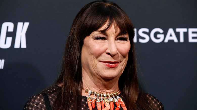 Anjelica Huston smiling on red carpet